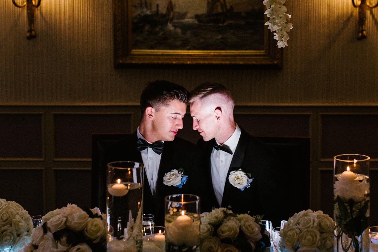 Wedding couple attending meal at night